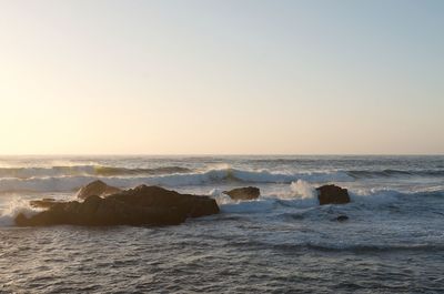 Scenic view of sea against clear sky