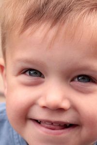 Close-up portrait of smiling boy