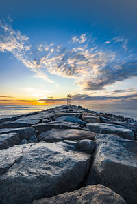 Scenic view of sea against sky during sunrise