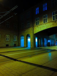 Illuminated building in city at night