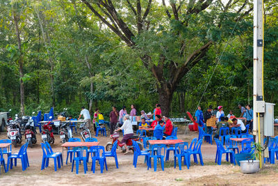 Empty chairs in park