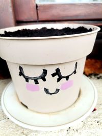 Close-up of coffee cup on table