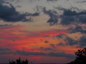 Low angle view of dramatic sky during sunset