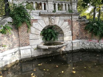 View of built structure with water in foreground