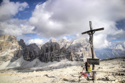 Dolomites, detail of the crucifix of the tofane mountain group, a unesco world heritage 