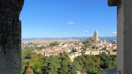 Panoramic view of town against sky