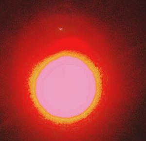 Red light against sky at night