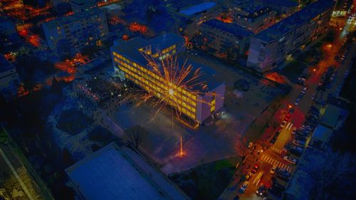 High angle view of illuminated cityscape