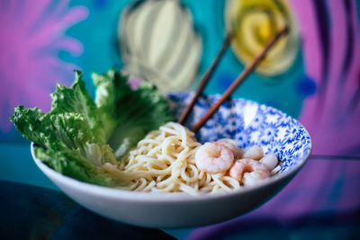 Close-up of noodles in bowl on table