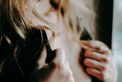 Close-up of woman with hands