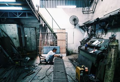 Welder working in workshop