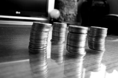 Close-up of coins on table