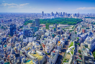 Aerial view of cityscape against sky