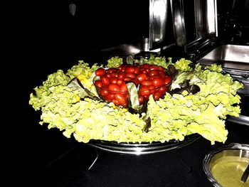 Close-up of chopped fruits in container