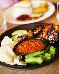 Close-up of food served in plate on table