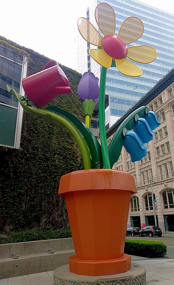 LOW ANGLE VIEW OF POTTED PLANT ON BUILDING