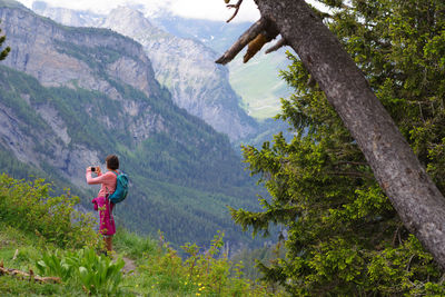 High angle view of people standing on mountain