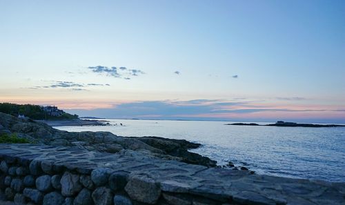 Scenic view of sea at sunset