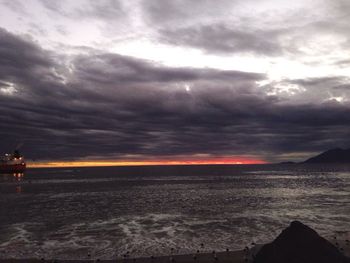 Scenic view of dramatic sky over sea