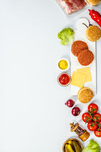 Close-up of burgers on serving board