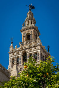 Low angle view of cathedral against clear blue sky