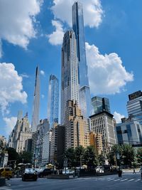 Low angle view of skyscrapers against sky