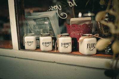 Close-up of text on glass jar