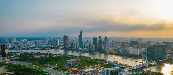 High angle view of buildings against sky during sunset