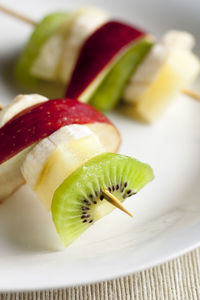 Close-up of lemon slice in plate