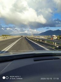 View of road through car windshield