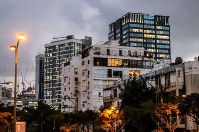 Illuminated buildings in city