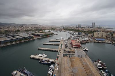 High angle view of boats moored at harbor