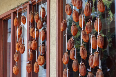 Full frame shot of clothes hanging on wood