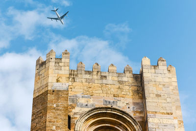 Low angle view of old building against sky