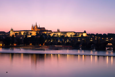 Prague old town seen from the vltava river at sunset