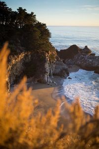 Scenic view of sea against sky at sunset