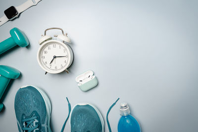 High angle view of clock on table