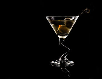 Close-up of cocktail against black background