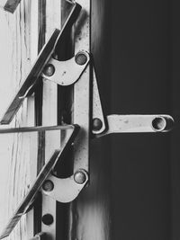 Close-up of chain on wood