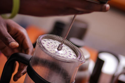 Close-up of hand holding coffee