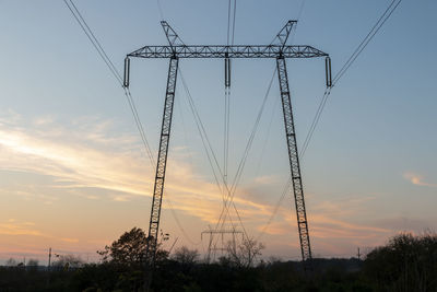 High voltage power lines at dawn