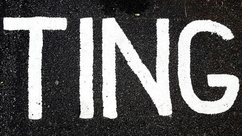 High angle view of ting text on road