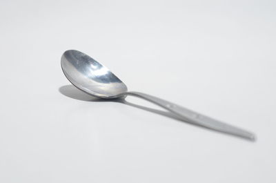 Close-up of electric lamp against white background