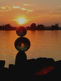 Scenic view of sunset over river