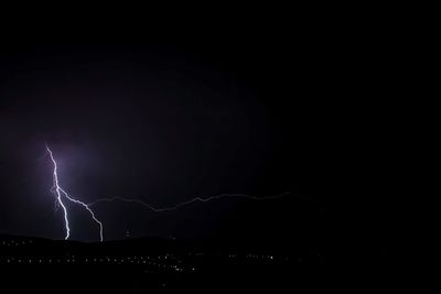 View of illuminated dark dark sky