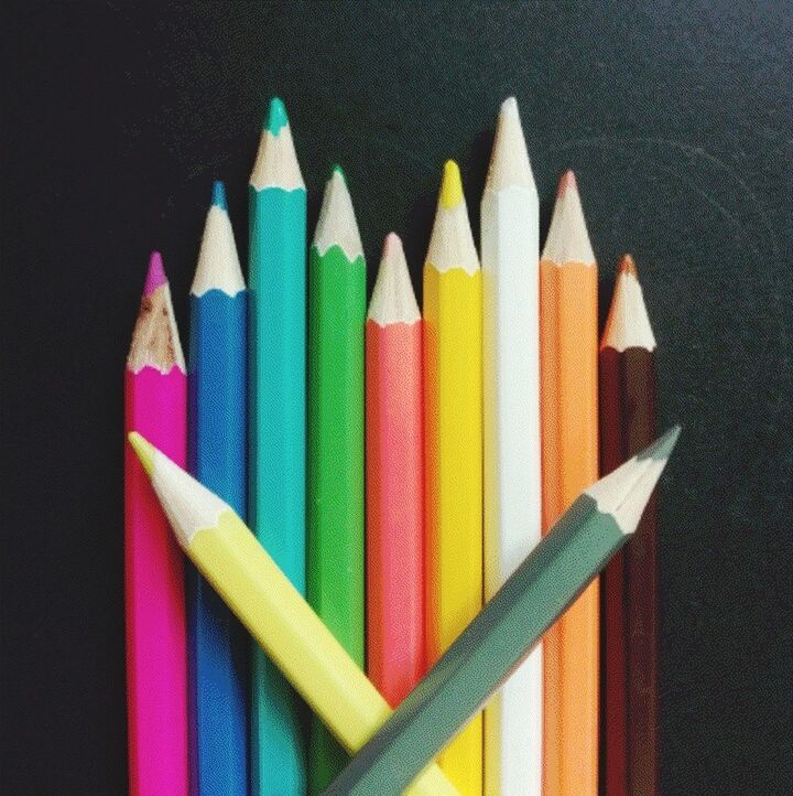 HIGH ANGLE VIEW OF MULTI COLORED PENCILS IN KITCHEN