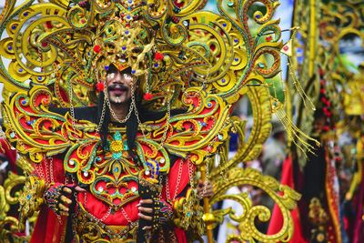 Close-up of portrait of man wearing costume