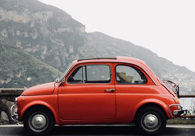 Vintage car on mountain road