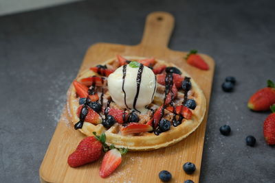 Close-up of chopped fruits on cutting board