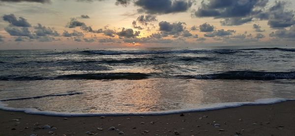 Scenic view of sea against sky during sunset